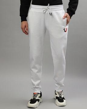 joggers with logo embroidery