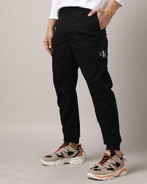 joggers with logo patch