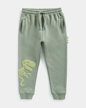 joggers with embossed dinosaur print