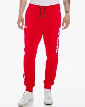 joggers with placement brand print