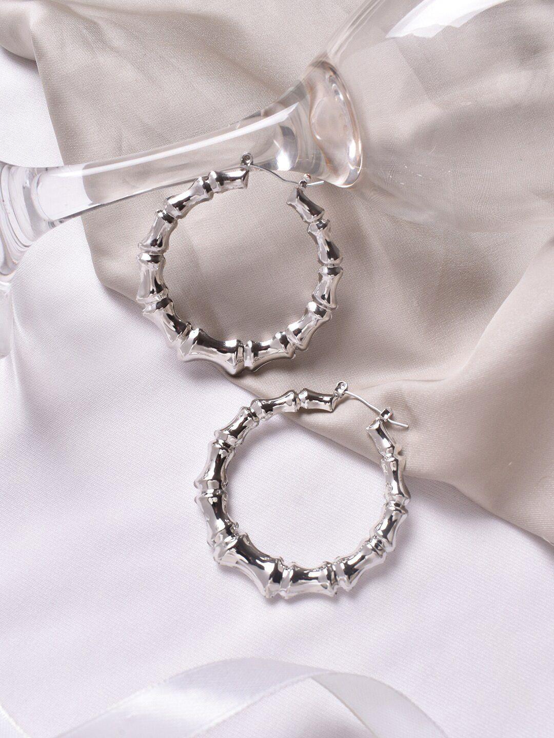 joker & witch silver-toned contemporary hoop earrings