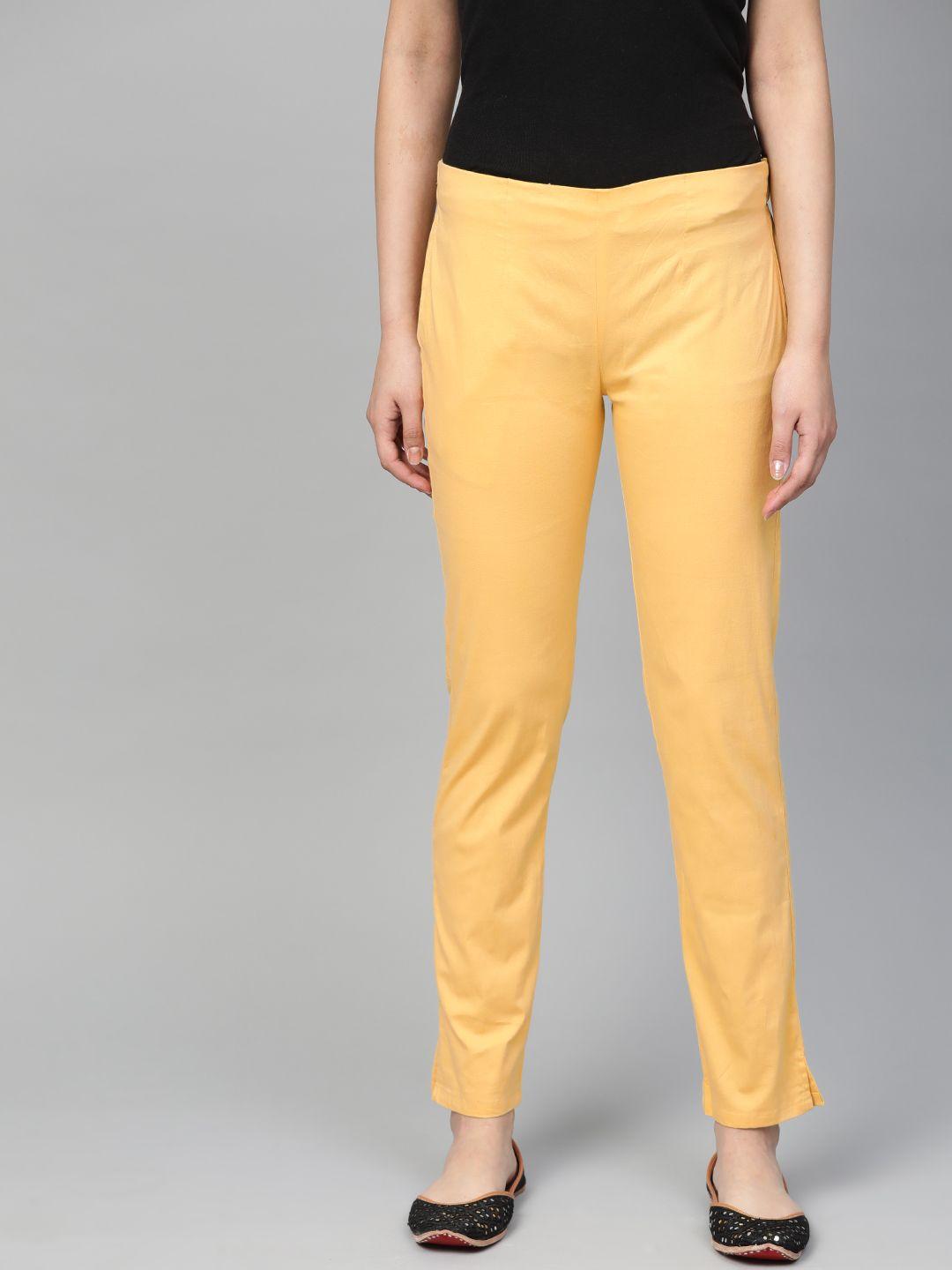jompers women yellow smart slim fit solid cigarette trousers