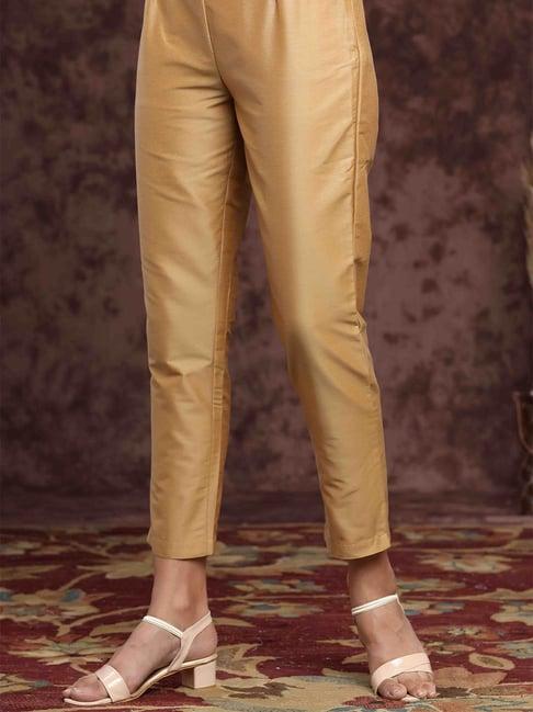 juniper gold solid poly silk slim fit pants with zip closure