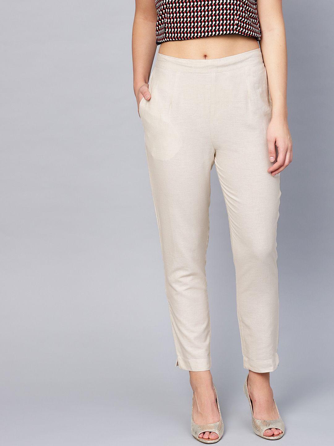 juniper women off-white urban slim slim fit solid regular trousers