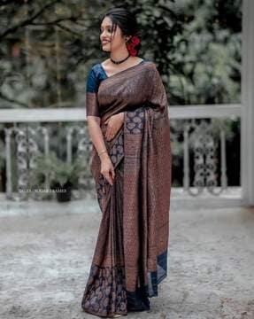 kanjeevaram woven paisley printed saree