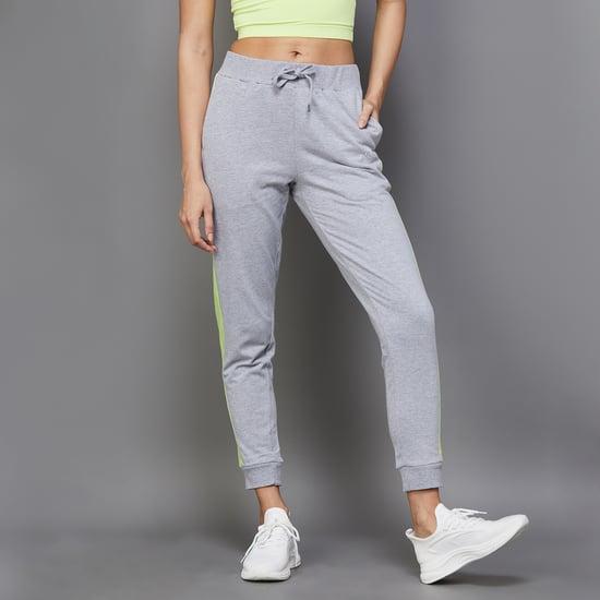 kappa women solid side-taped elasticated joggers