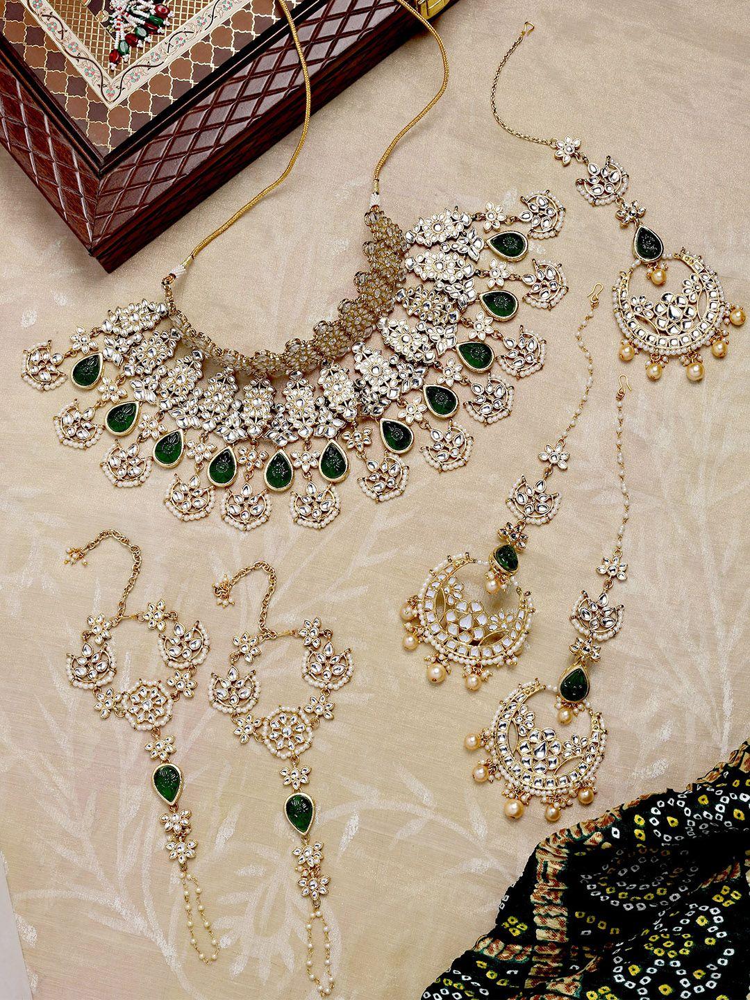 karatcart gold-plated kundan-studded & beaded jewellery set with maang tikka & hathphool