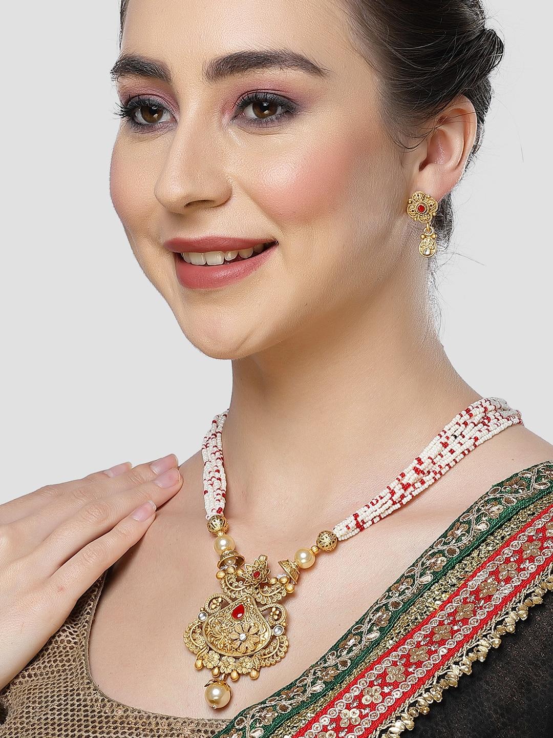 karatcart gold-plated kundan-studded jewellery set