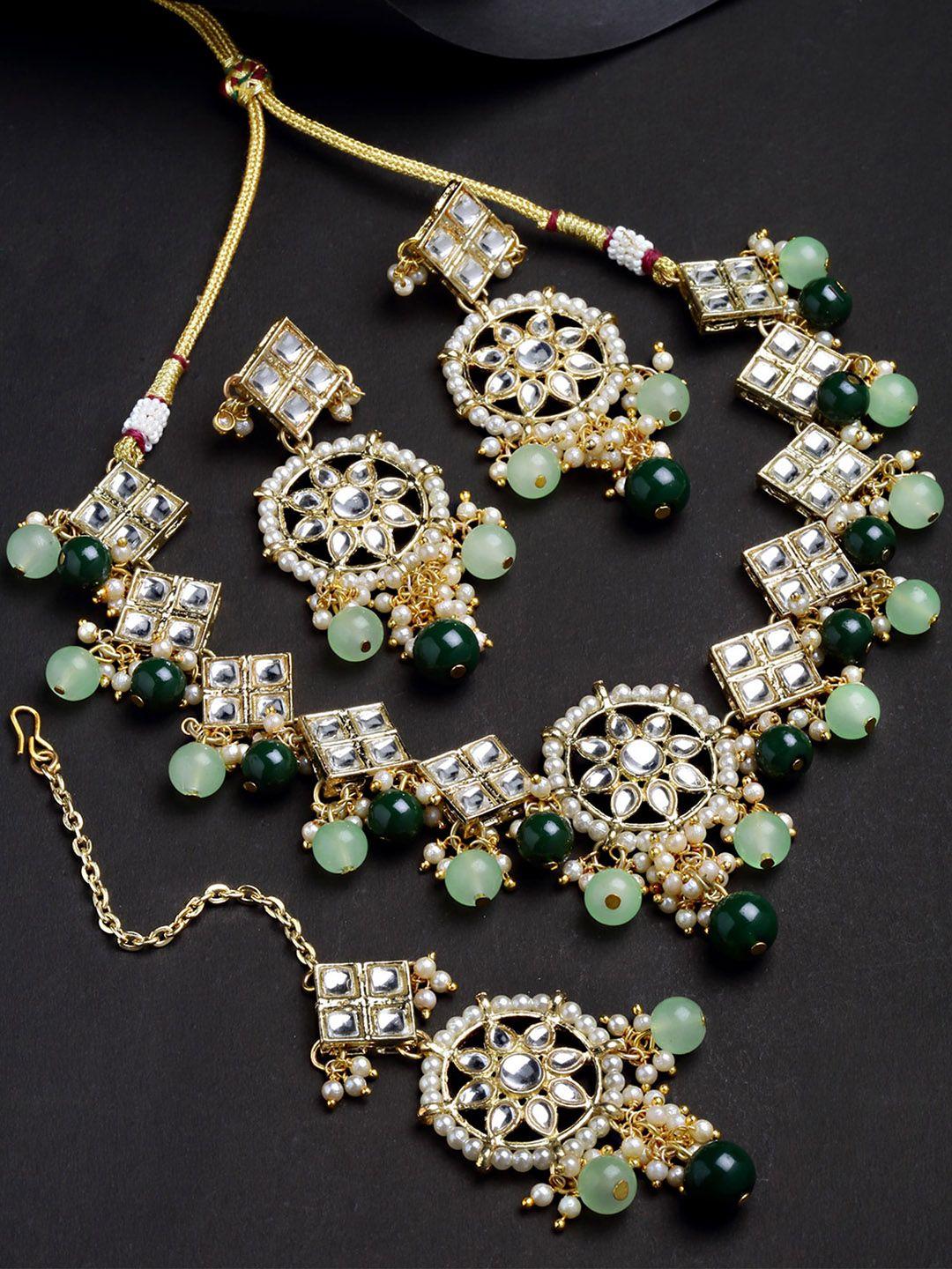 karatcart gold-plated green kundan studded & beaded jewellery set