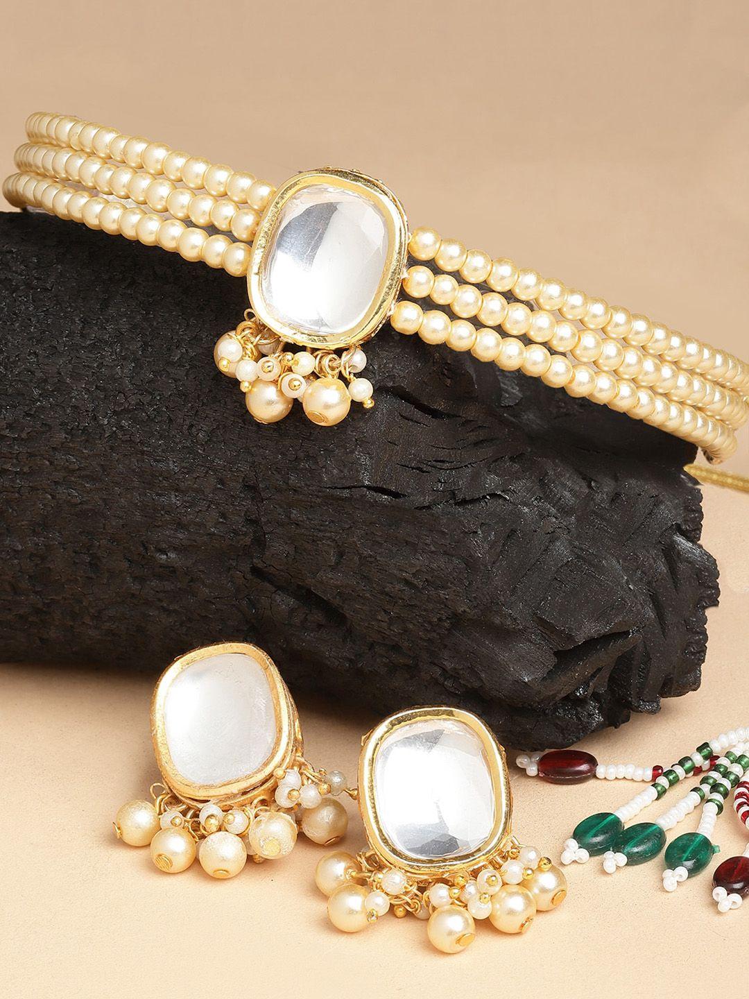 karatcart gold-plated white & beige kundan studded & beaded jewellery set