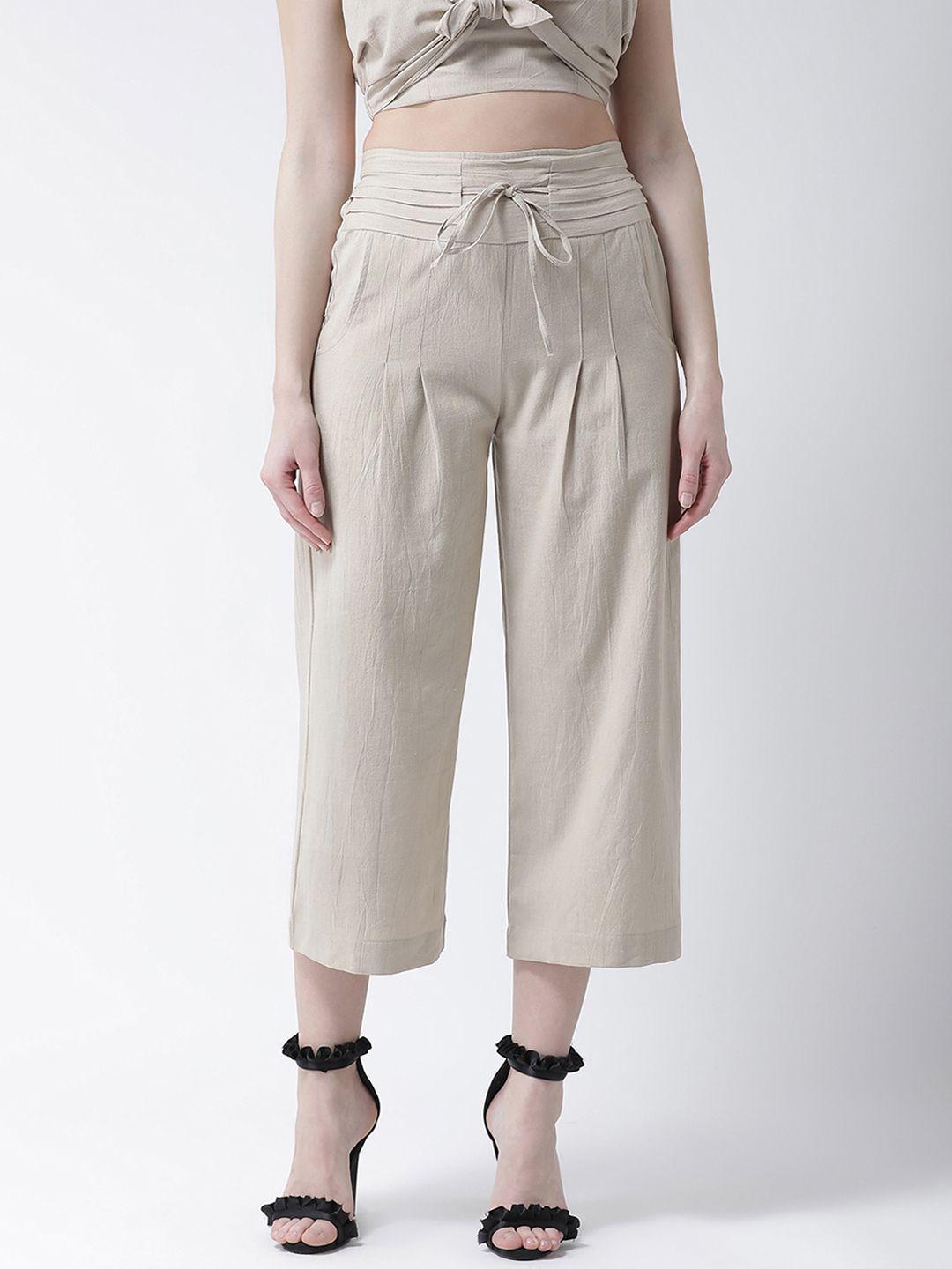 kassually women beige regular fit solid parallel trousers