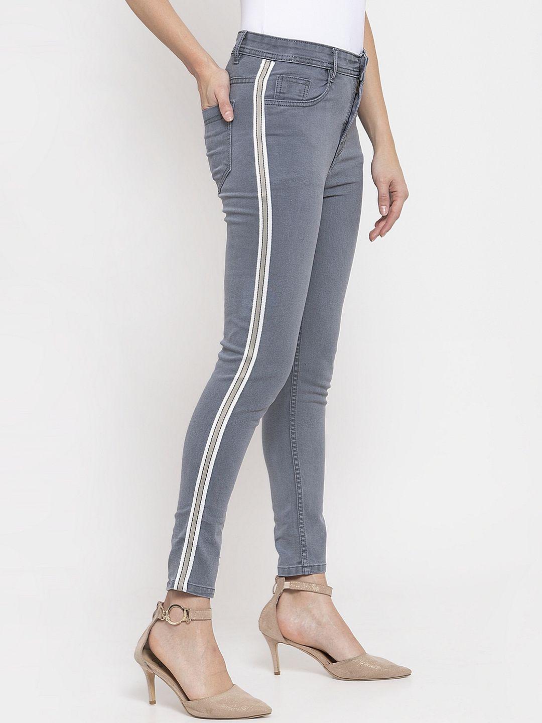 kassually women grey skinny fit mid-rise clean look jeans with side stripes