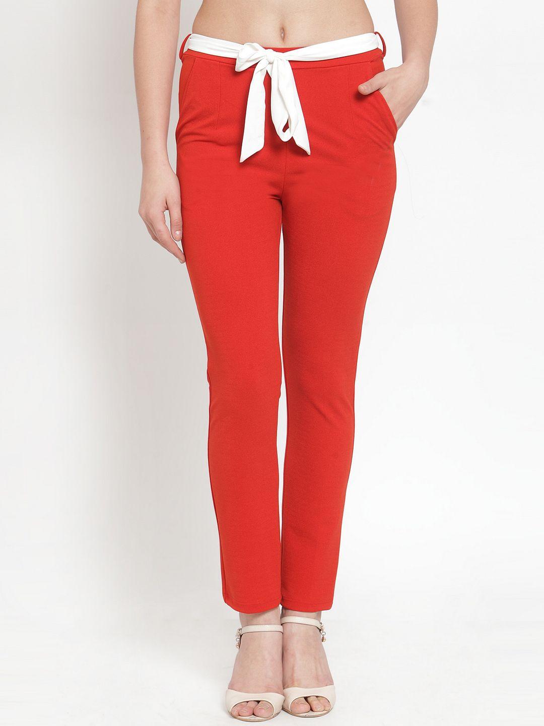 kassually women rust red slim fit solid peg trousers