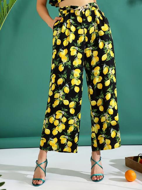 kassually black & yellow printed regular fit mid rise trousers