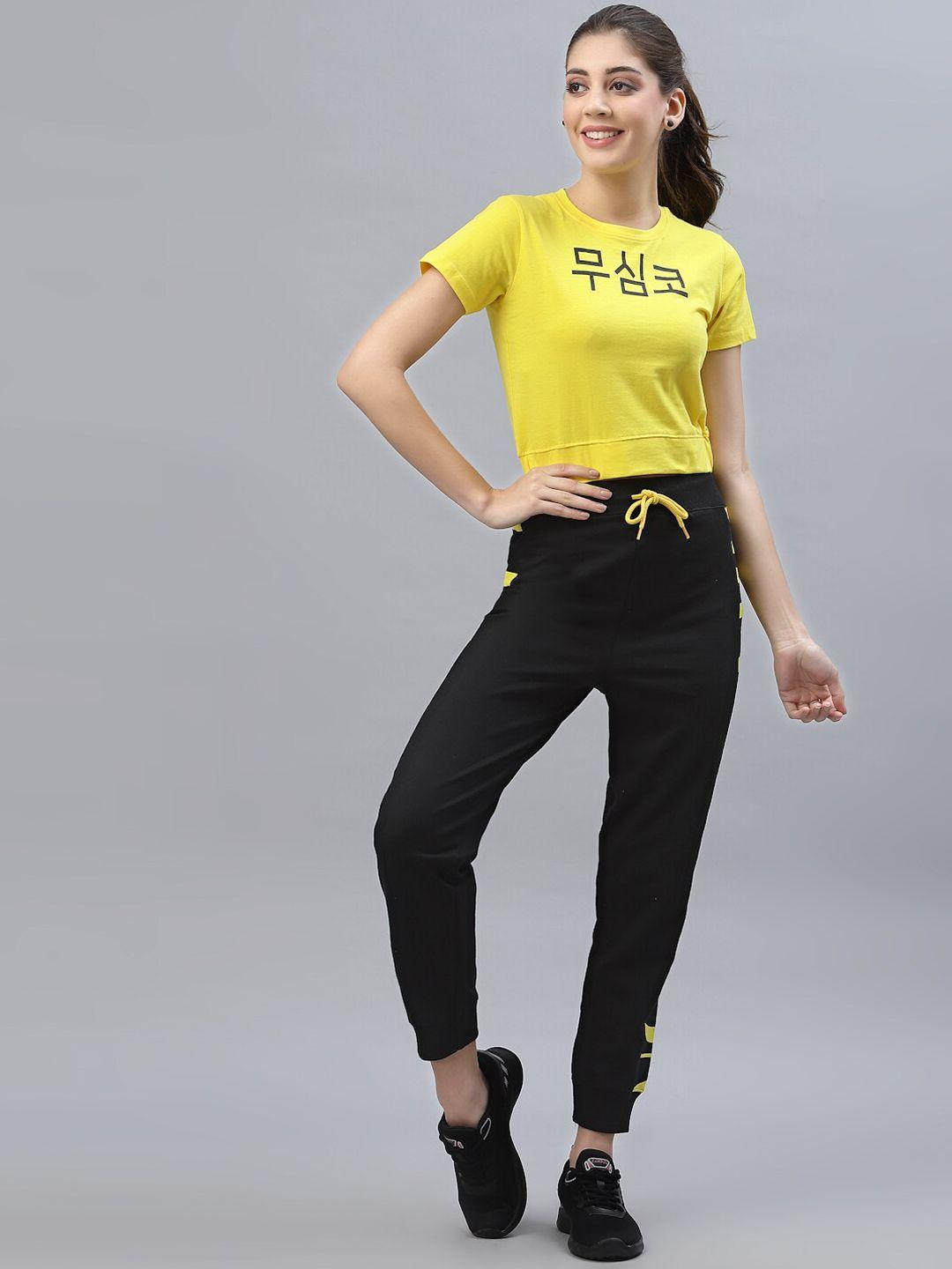 kassually women yellow & black solid tracksuits