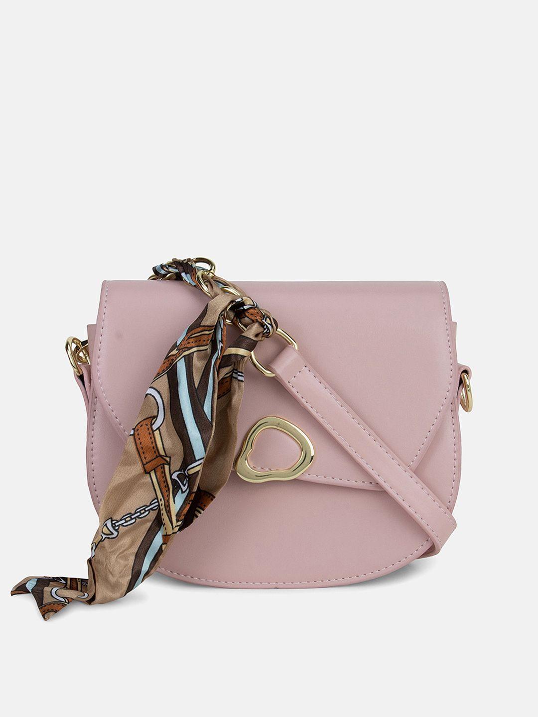 kazo peach-coloured pu structured sling bag with tasselled