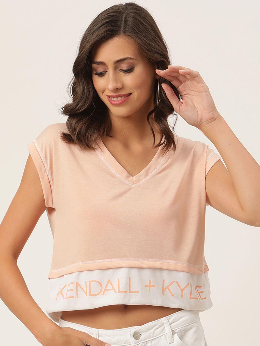 kendall & kylie peach-coloured typography print v-neck extended sleeves boxy crop t-shirt