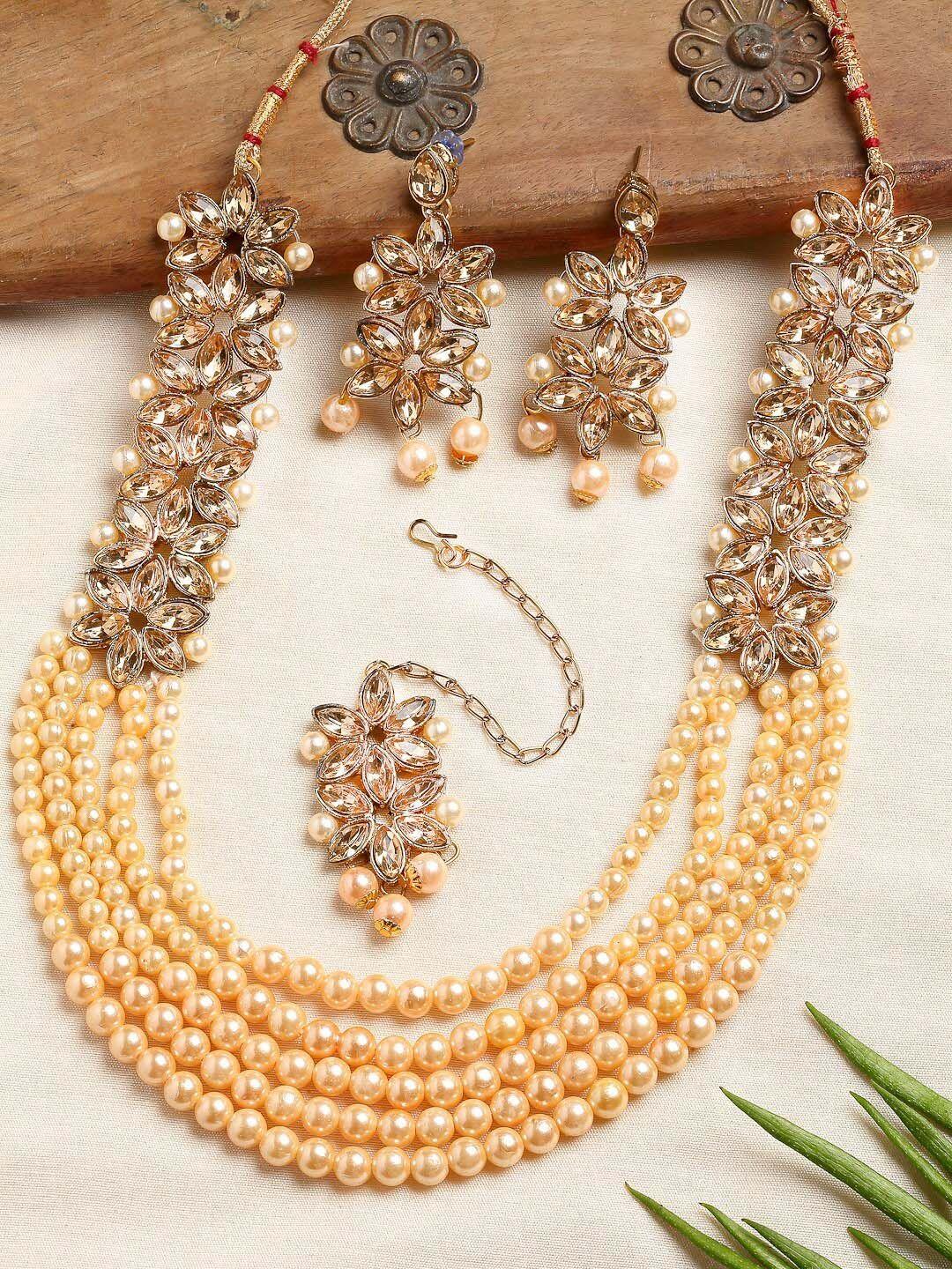 kennice gold-plated kundan studded & pearl beaded multi-stranded jewellery set