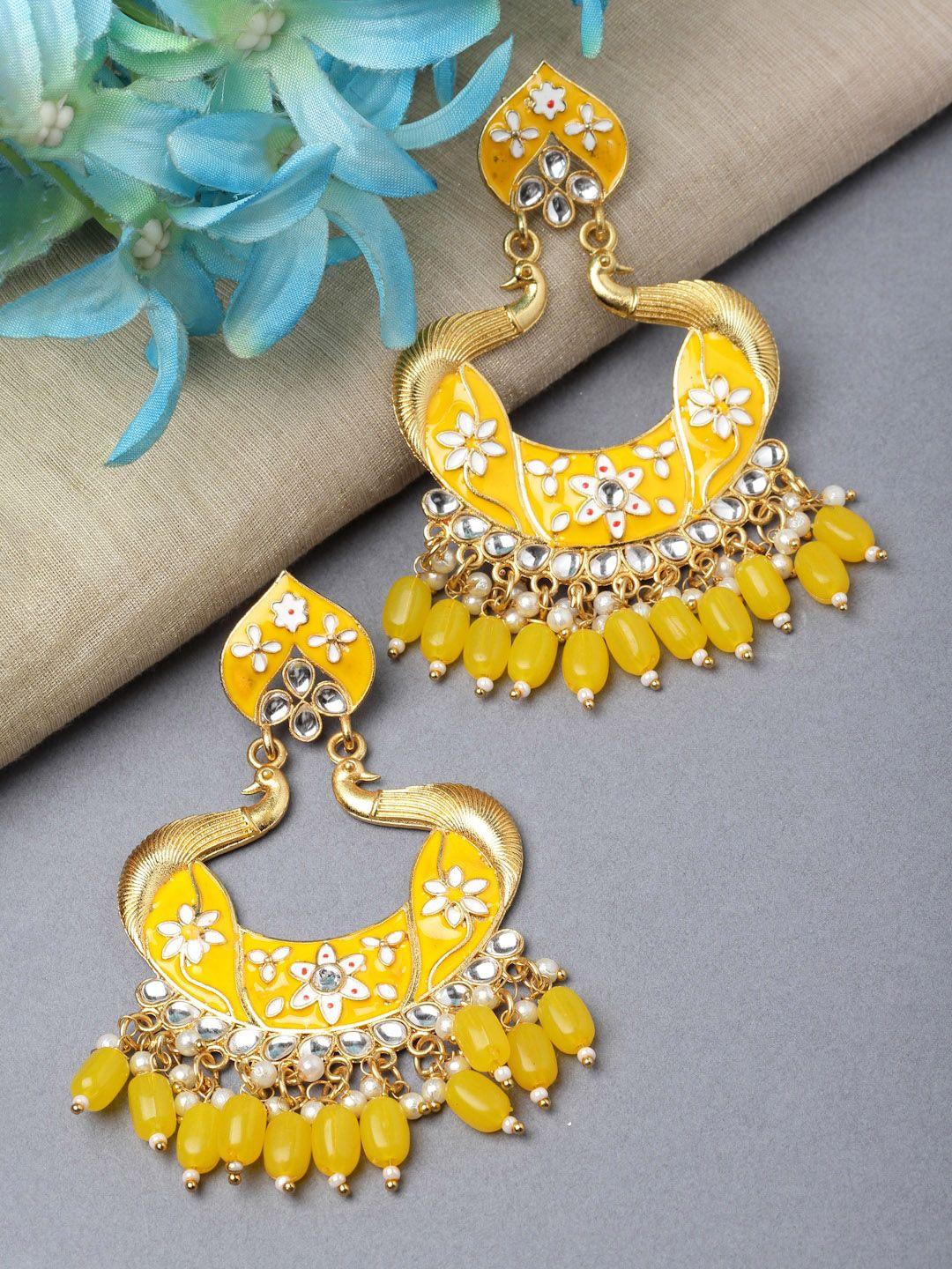 kennice gold-plated peacock shaped chandbali earrings