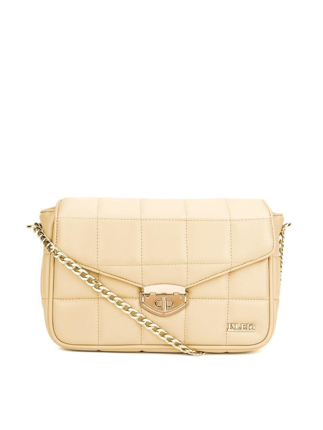 kleio textured quilted structured sling bag