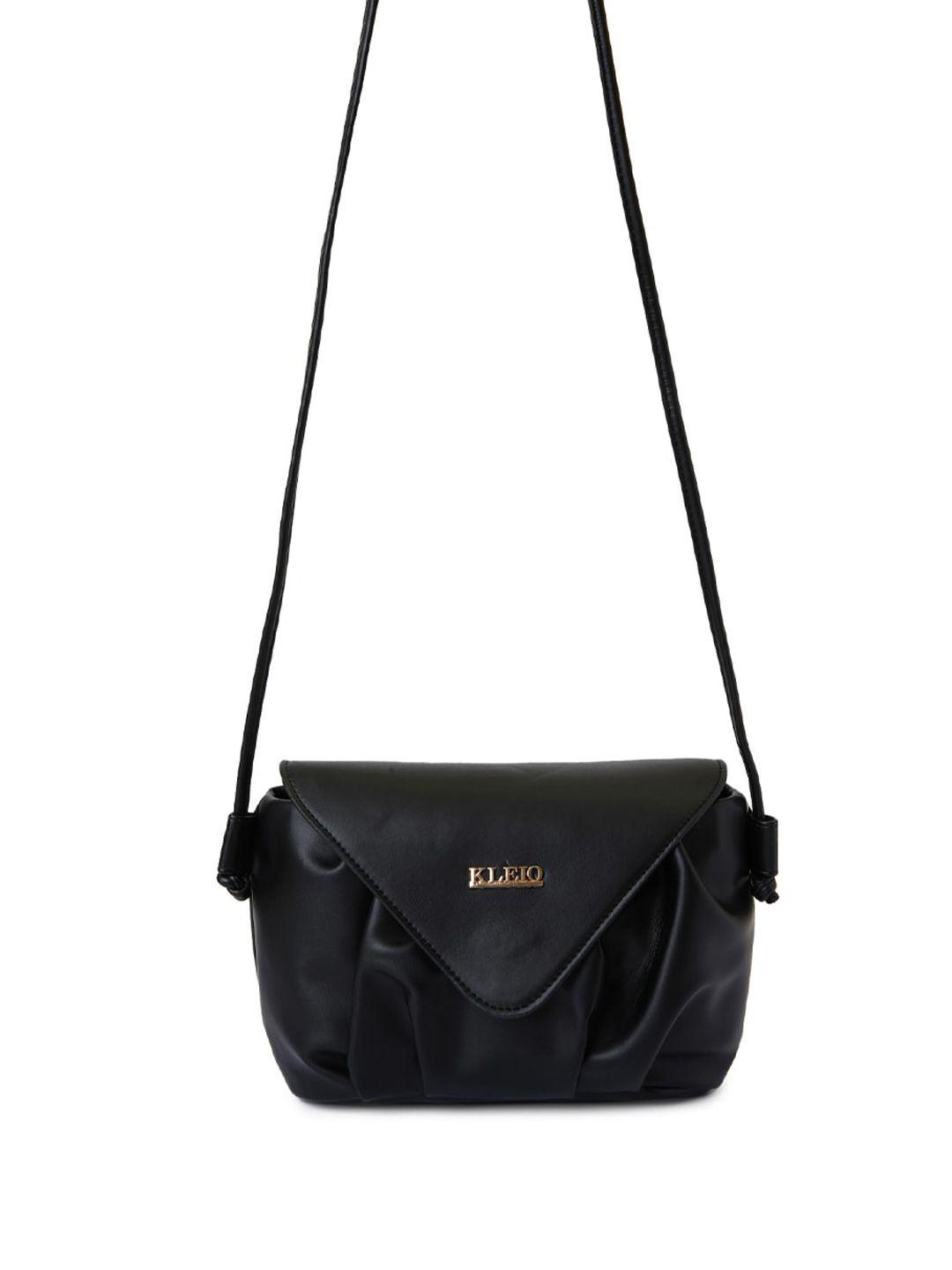 kleio black pu structured sling bag with tasselled