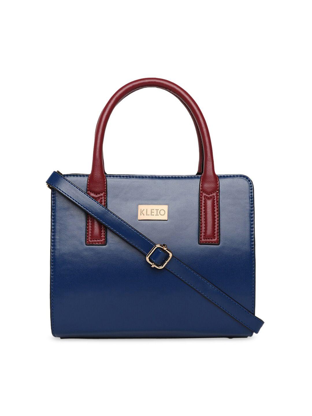 kleio blue colourblocked pu structured handheld bag with tasselled