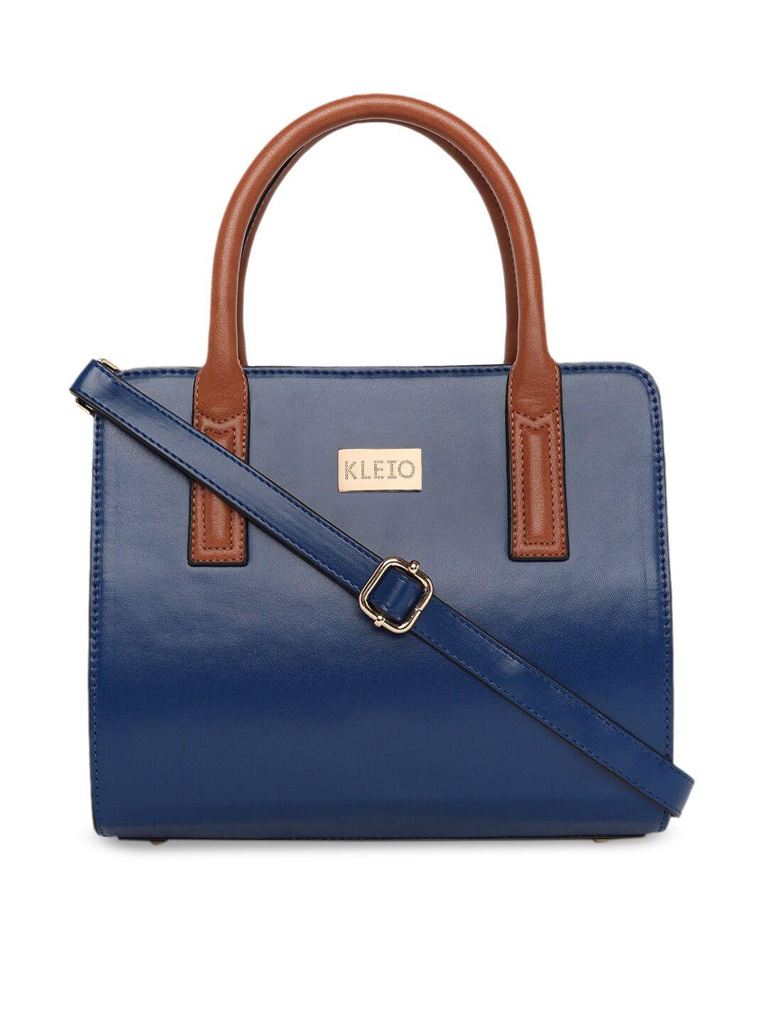 kleio blue colourblocked pu structured handheld bag