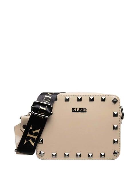 kleio cream solid small sling handbag