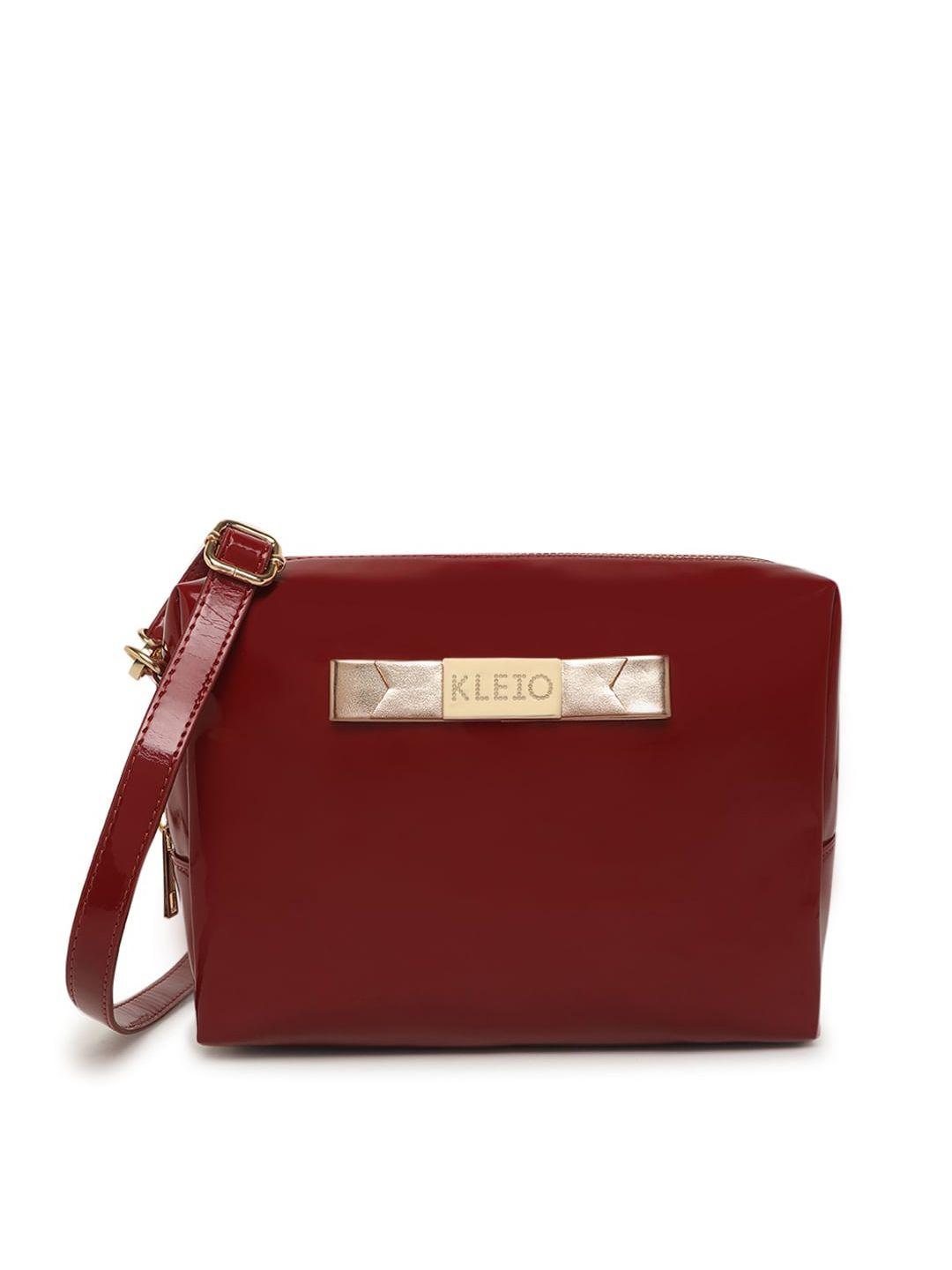 kleio maroon glossy finish structured sling bag with detachable sling strap & bow detail