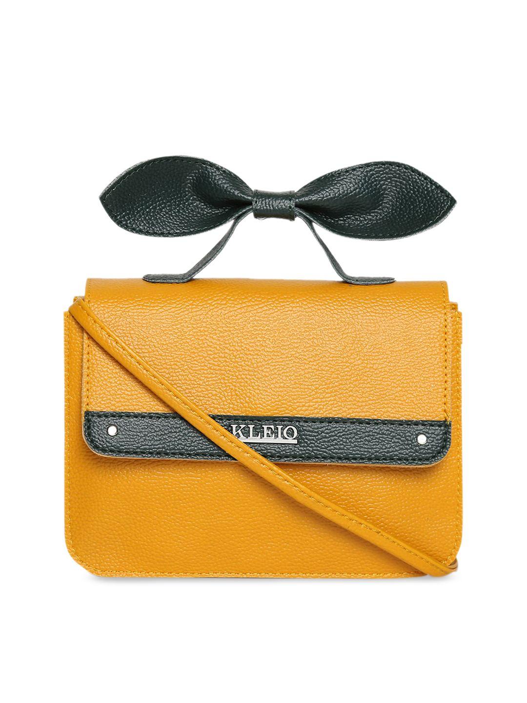 kleio mustard yellow textured handheld bag