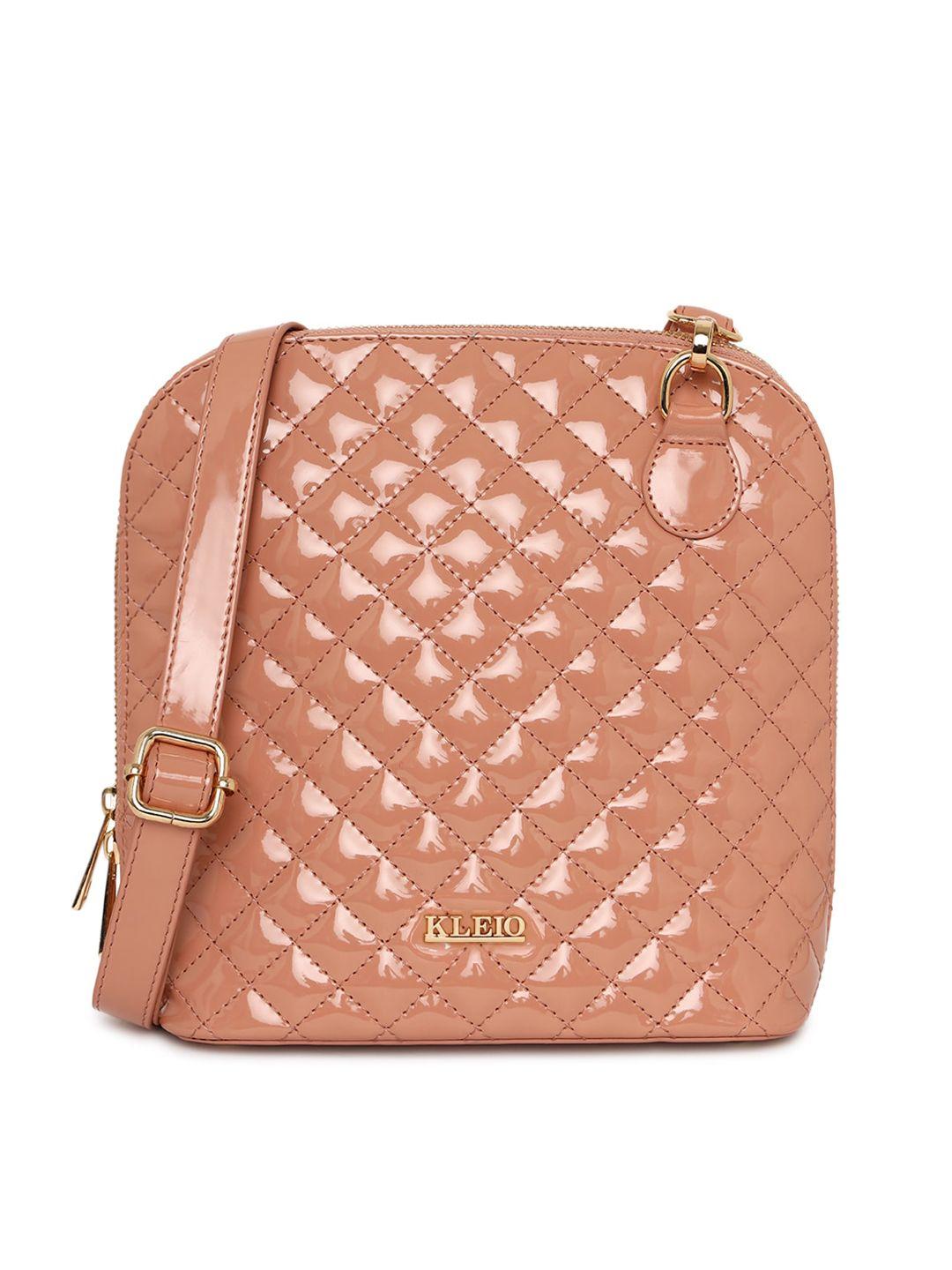 kleio peach-coloured quilted structured sling bag with detachable sling strap