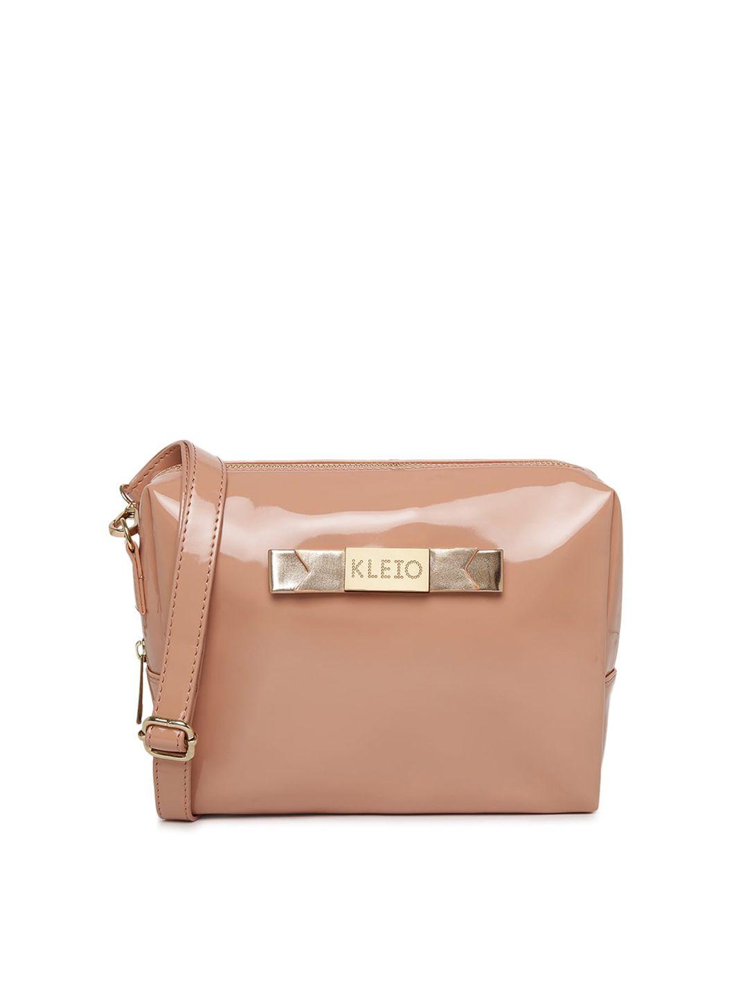 kleio peach-coloured structured sling bag