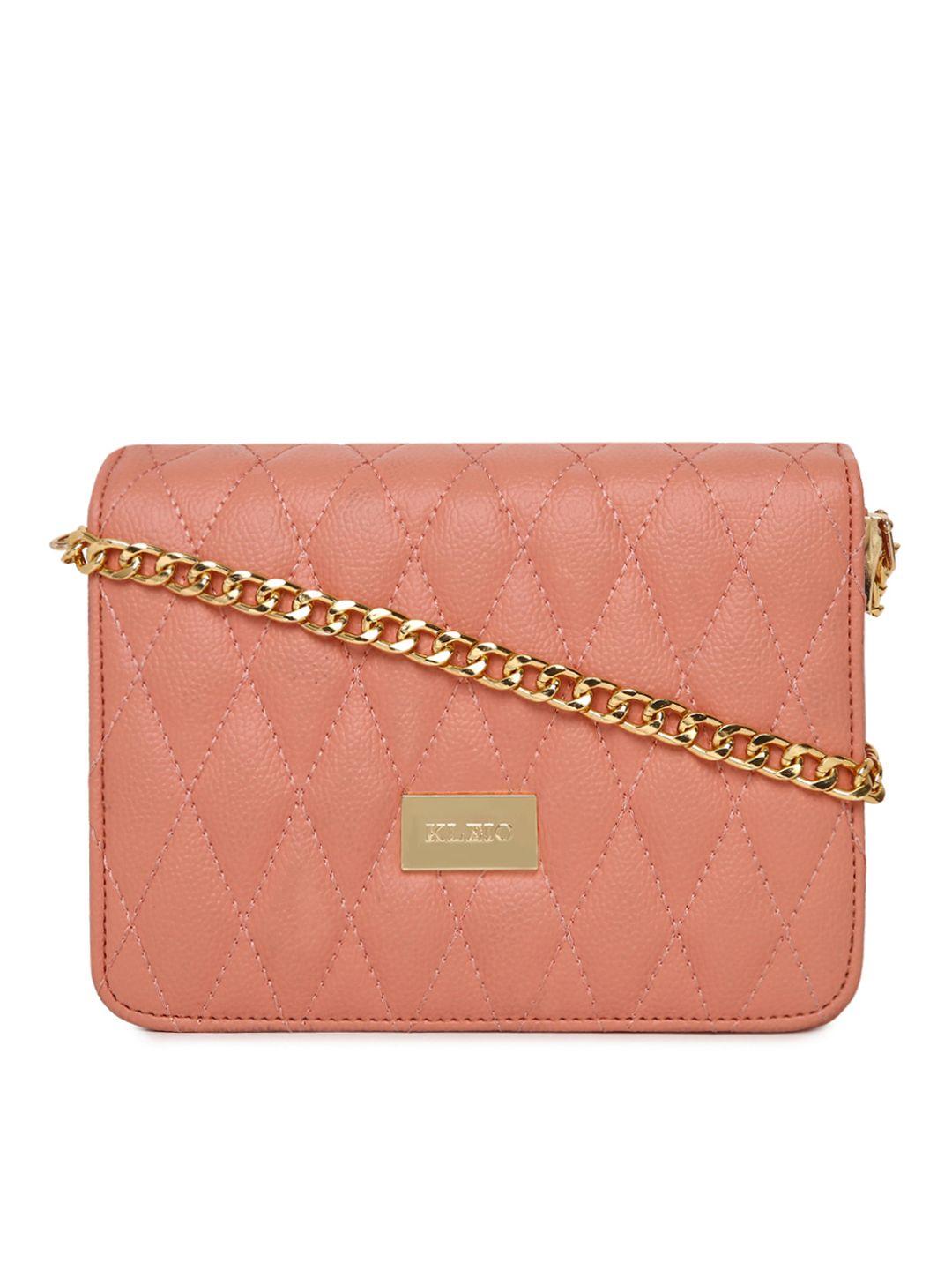 kleio peach-coloured textured sling bag