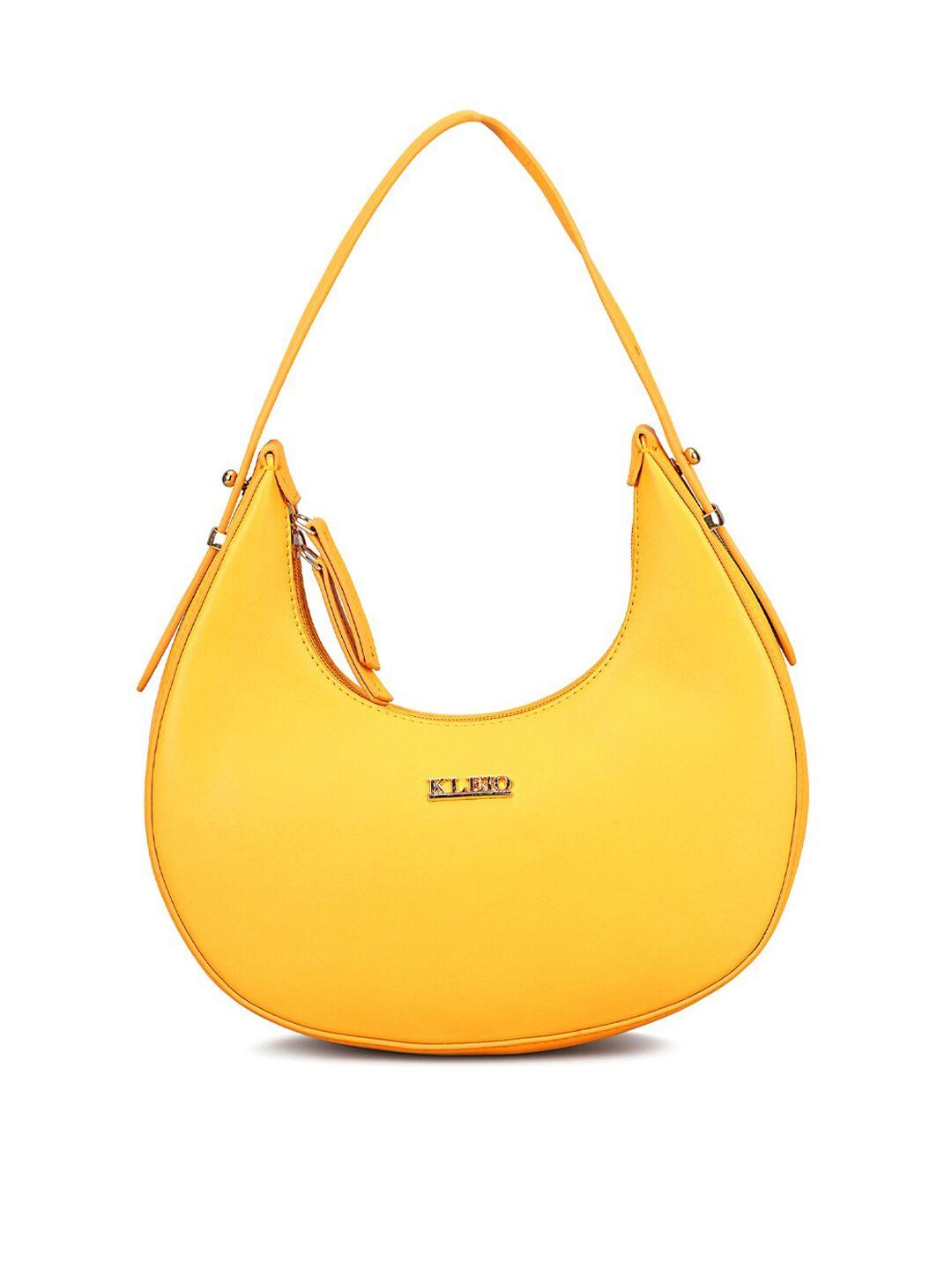 kleio pu bucket sling bag with tasselled