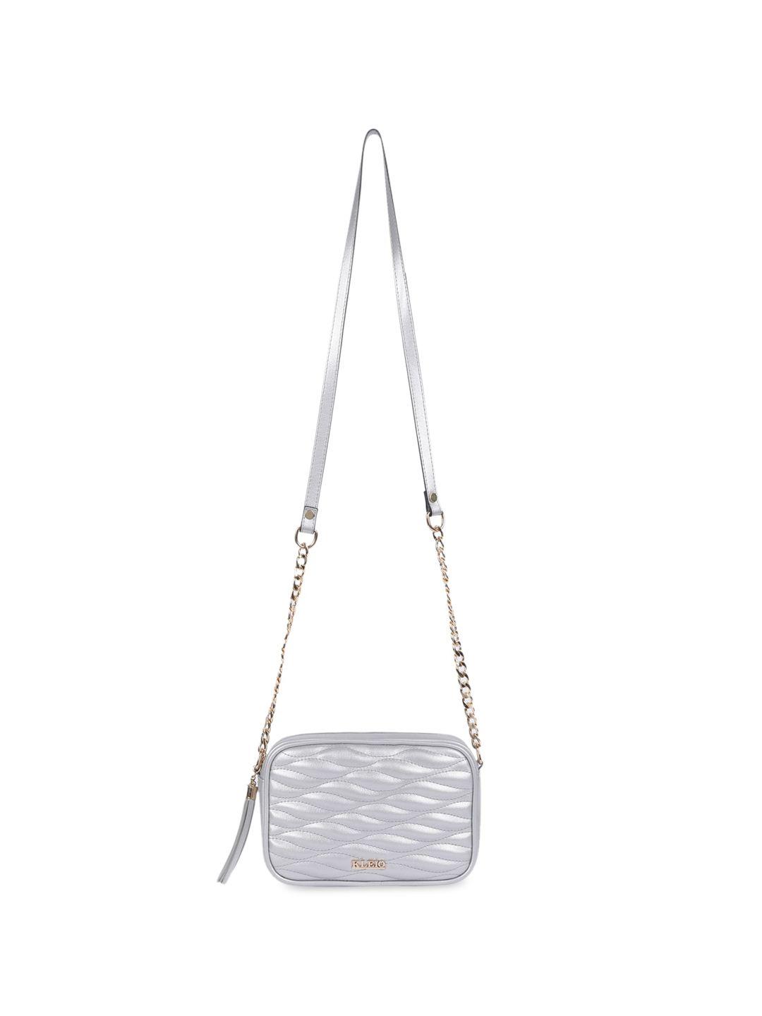 kleio quilted textured structured sling bag