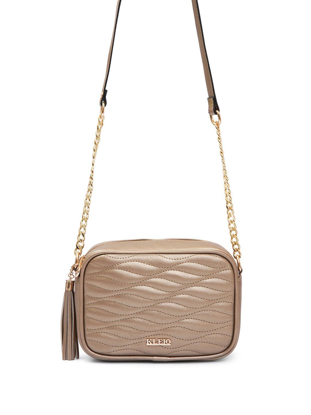 kleio textured quilted structured sling bag