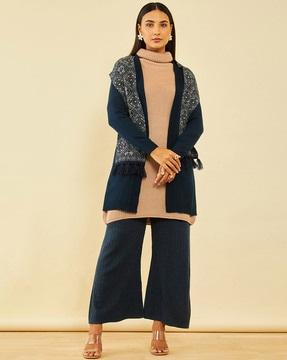 knitted shrug with tassels