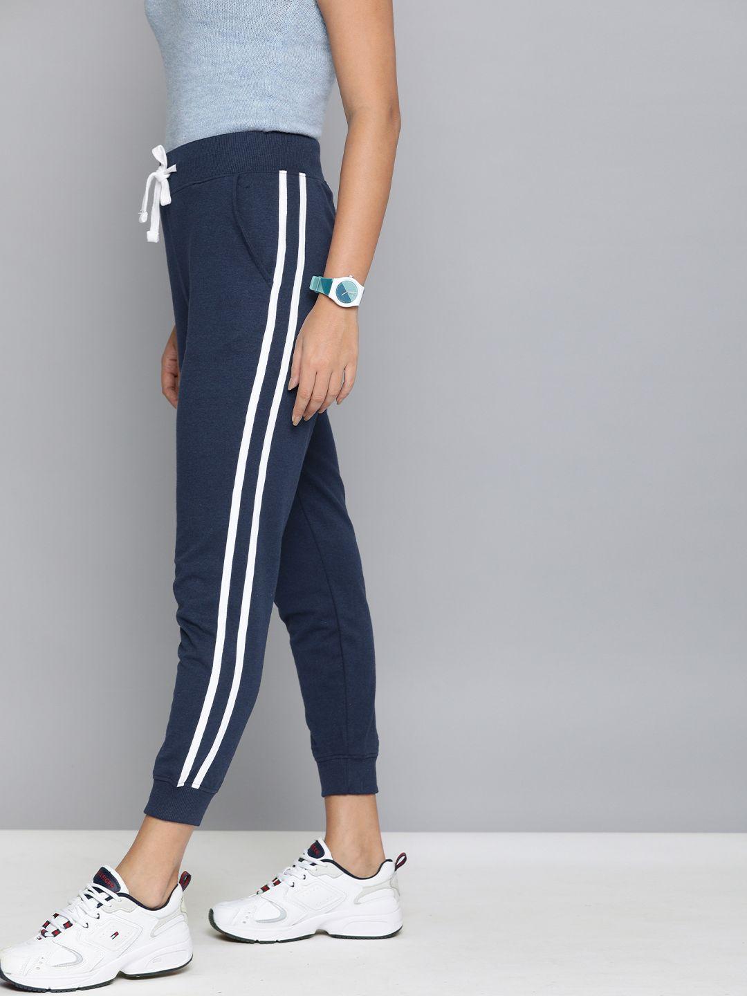 kook n keech women navy blue solid crop joggers with side striped detail