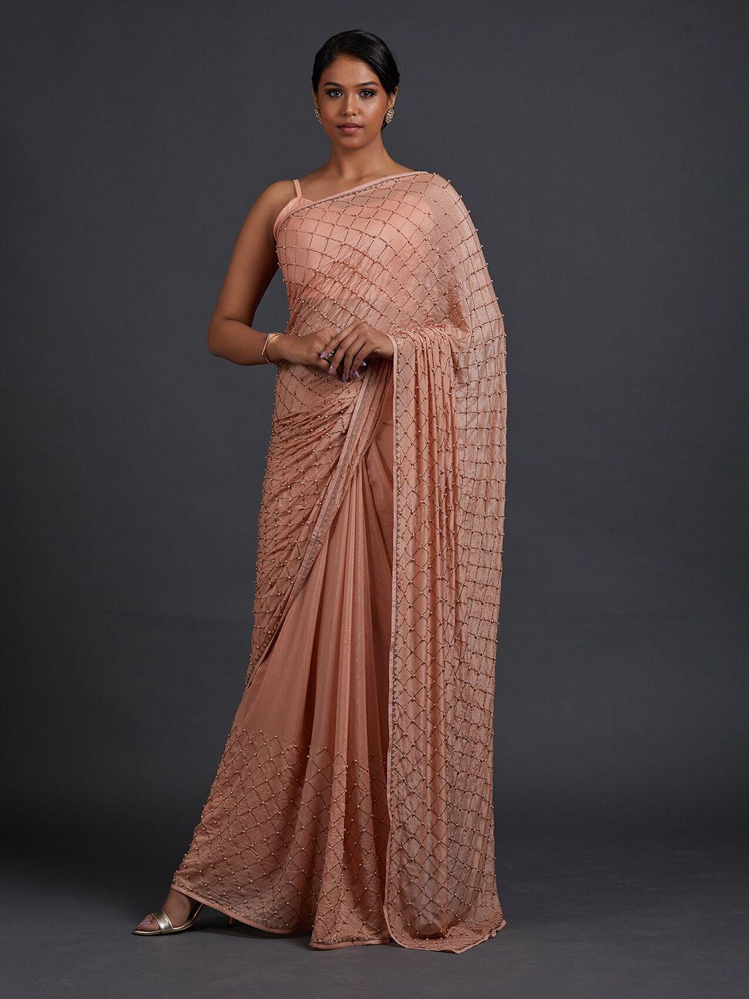 koskii peach-coloured embroidered saree