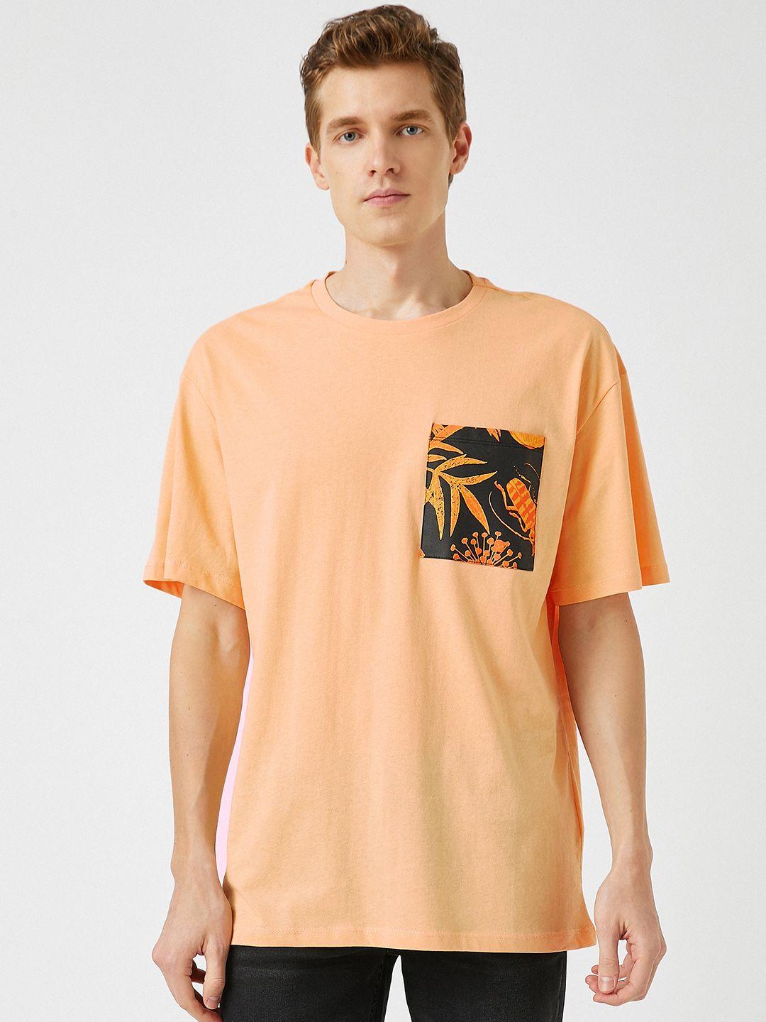 koton men peach-coloured solid drop-shoulder sleeves pure cotton t-shirt