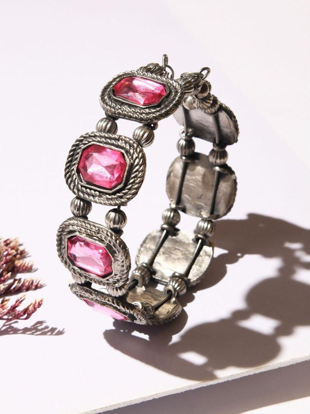 krelin women silver-toned & pink german silver oxidised brass-plated bangle-style bracelet