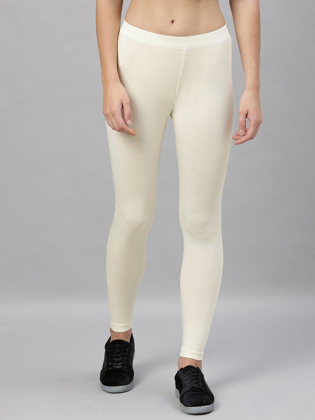 kryptic women cream-coloured solid ankle length leggings