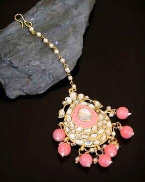 kundan-studded enamel mangtika