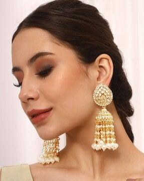 kundan-studded pearl drop jhumka earrings