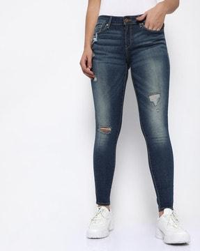 l.s. distressed low-rise skinny jeans