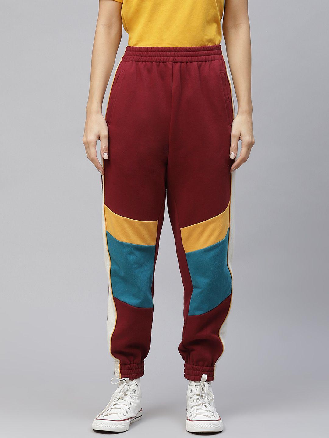 laabha women maroon & teal blue colourblocked joggers with side taping detail