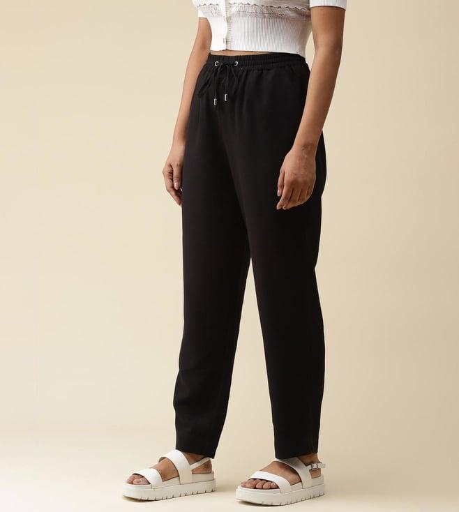 label ritu kumar black solid joggers pants