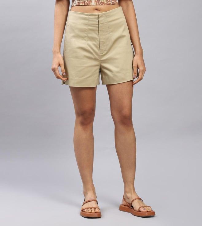 label ritu kumar tan high-waist shorts