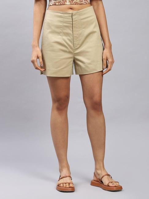 label ritu kumar tan shorts