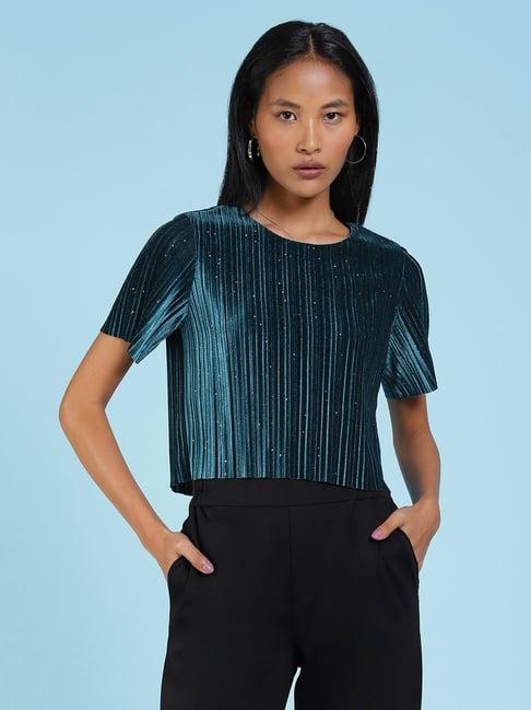 label ritu kumar teal top